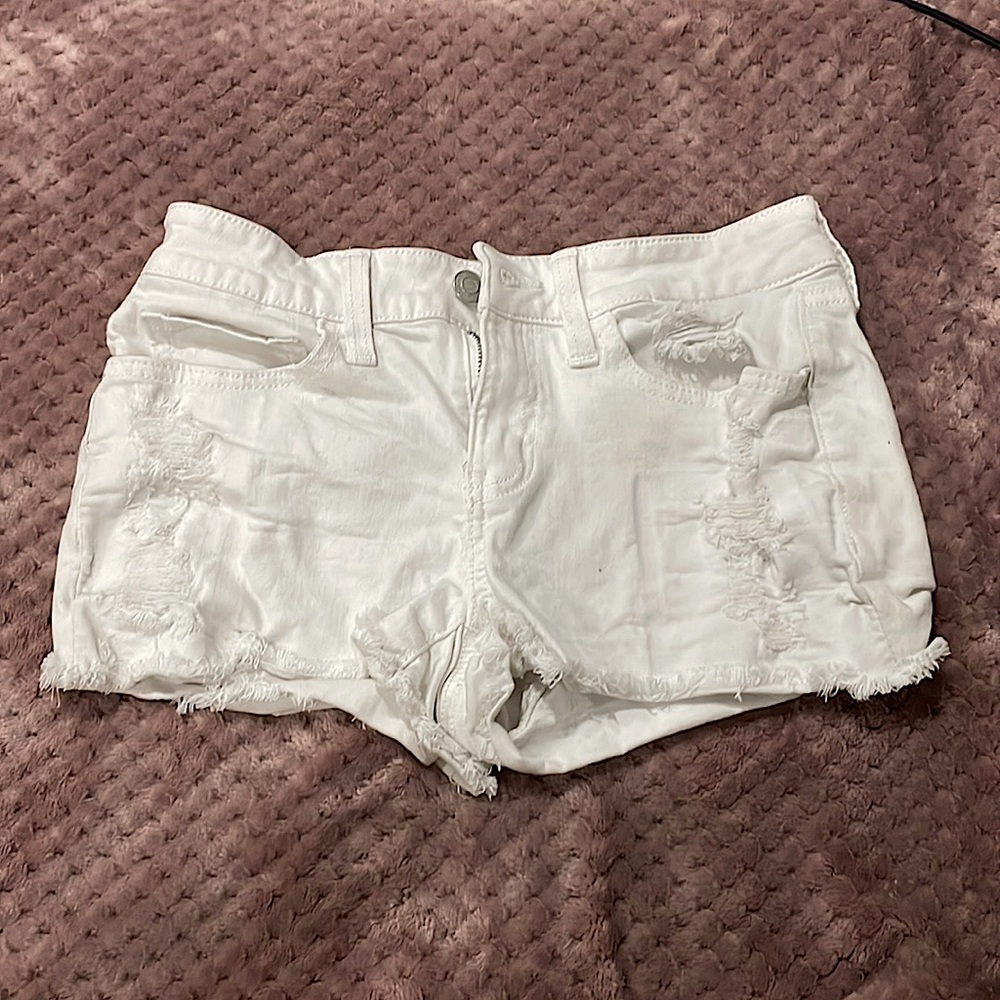 Kids white ripped jeans. Perfect condition. Used.